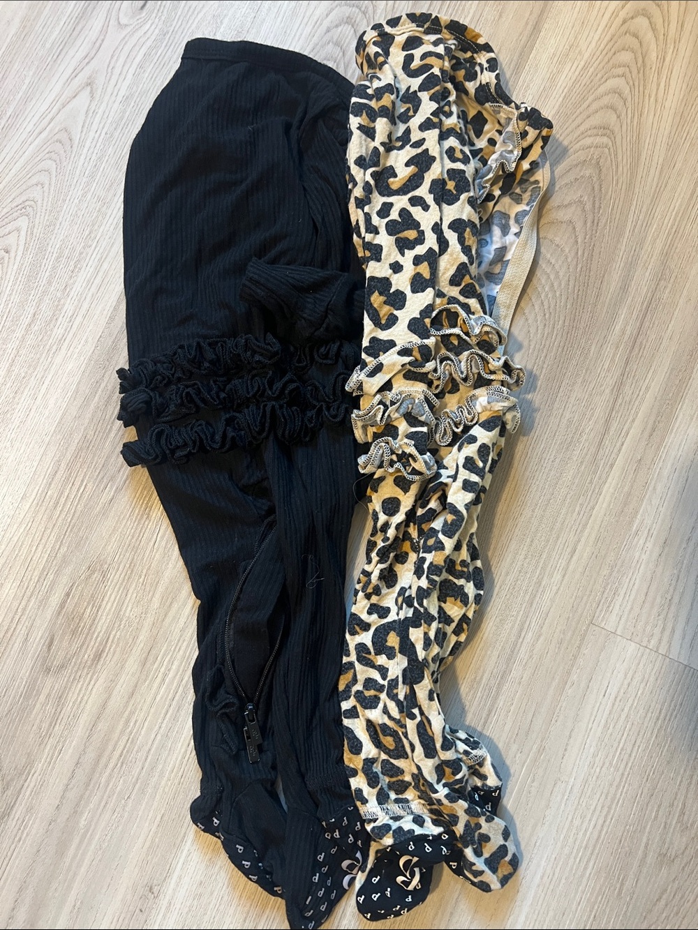 Posh Peanut Ribbed Black & Leopard Ruffle Footie Pajama bundle of 2